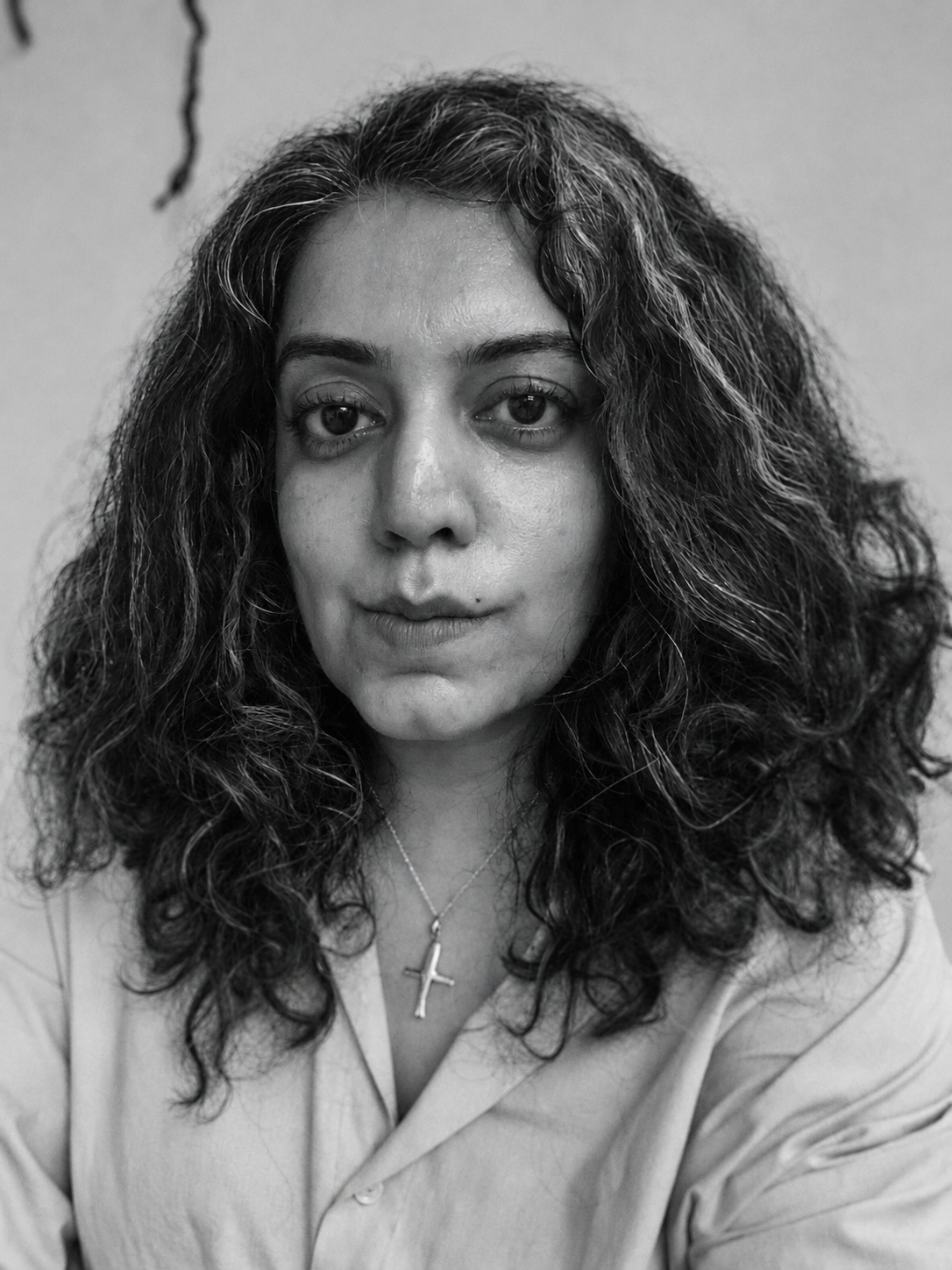 Black-and-white portrait of Meenakshi Thirukode